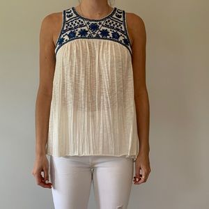 White with blue detailed top